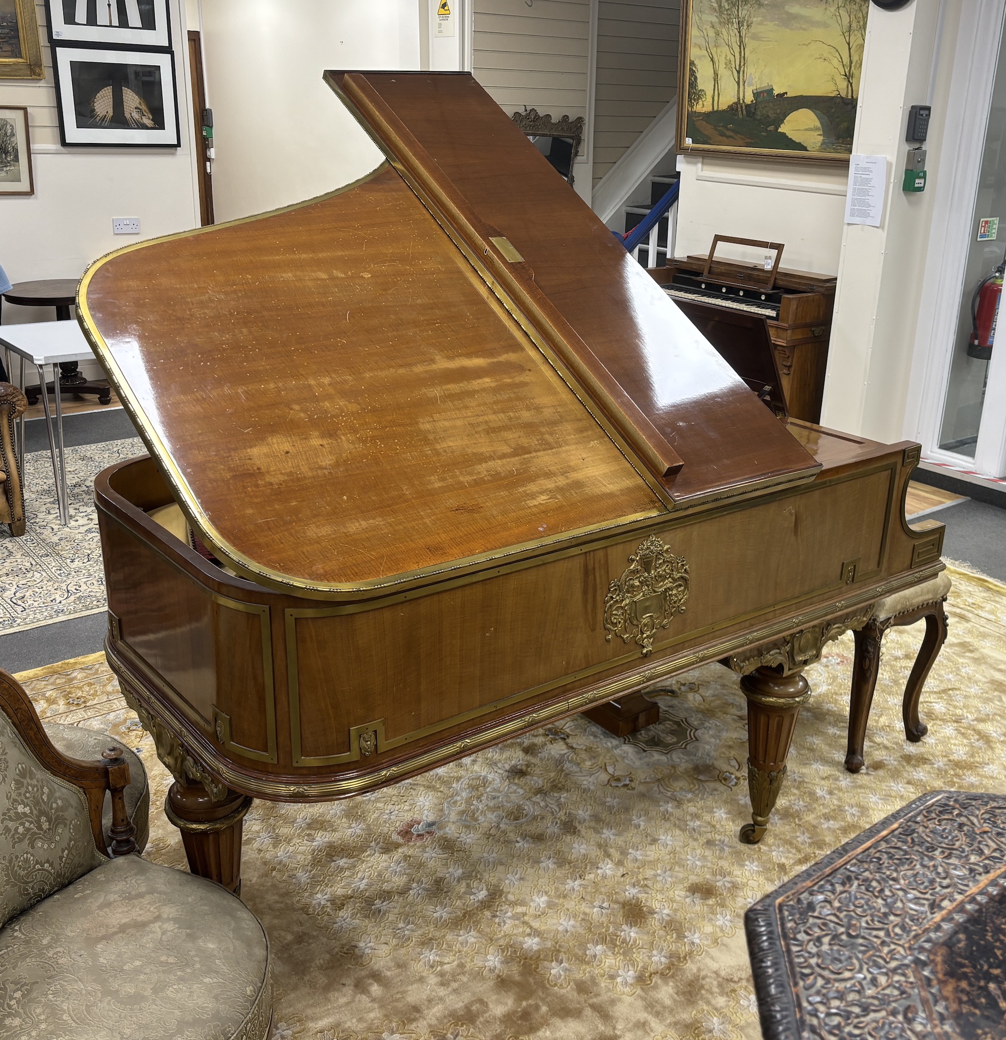 An Erard Louis XVI style mahogany and ormolu mounted boudoir grand piano, c1910 (ivory keys), length 180cm, depth 148cm, height 102cm together with a late Victorian mahogany duet piano stool, CITES Submission reference 5